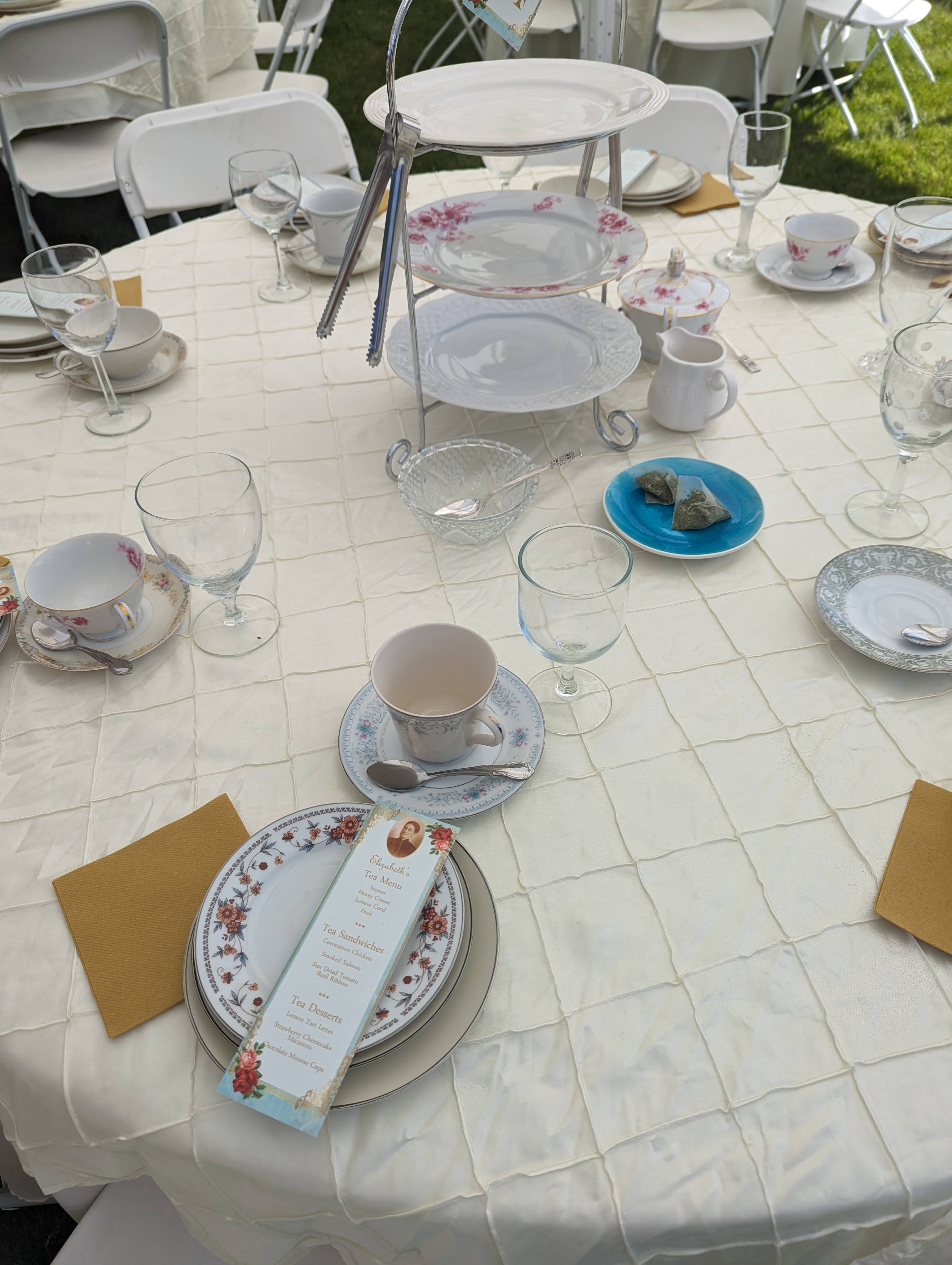 Table set for a victorian tea party in the gardens at the Whitaker Museum